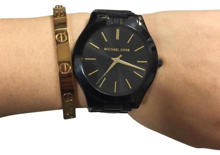 Buy Michael Kors Women s Slim Runway Ion tone Watch MK3221 Black eRomman